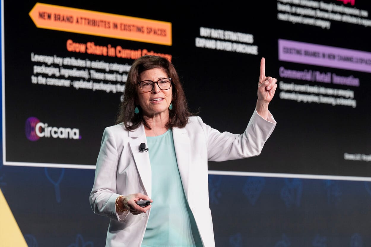 Image shows Sally Lyons Wyatt illustrating  the power of TikTok to business leaders at SOTIC. 