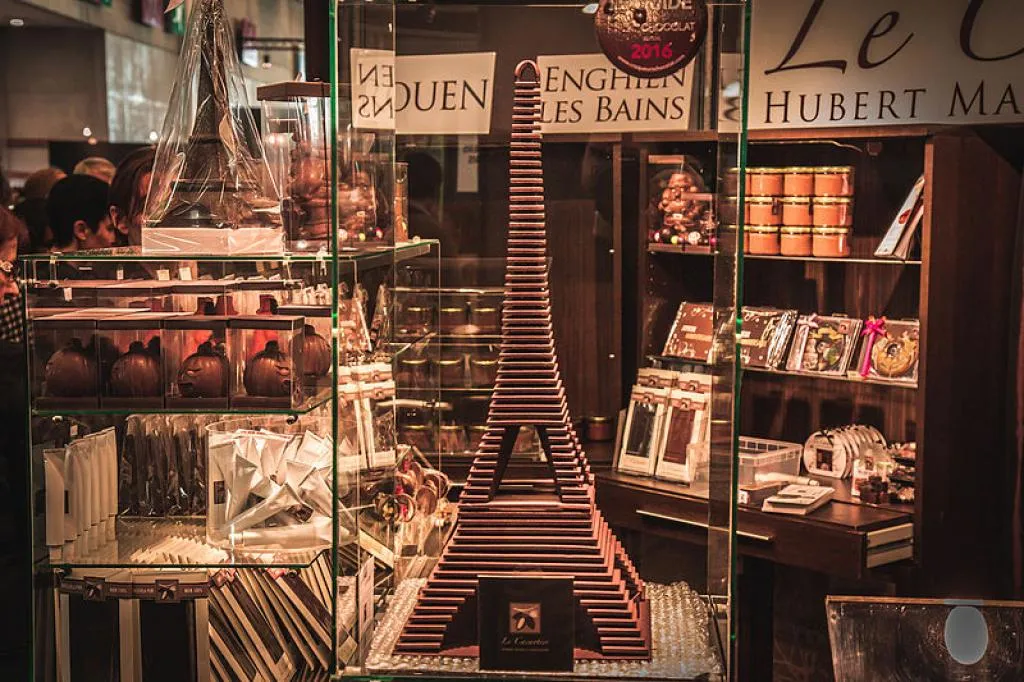 Image shows a chocolate Eiffel Tower in a shop window.
