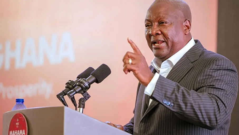 Image shows Former president of Ghana John Mahama giving a speech.