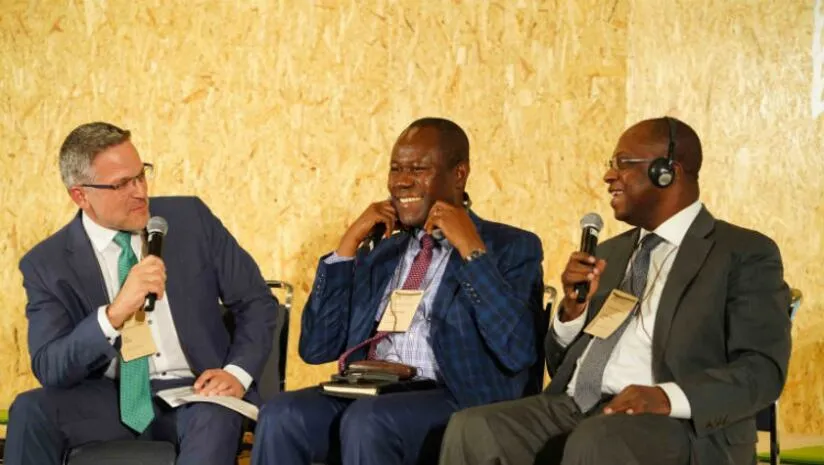 Image shows: Tim McCoy with Joseph Boahen Aidoo (Ghana Cocoa Board) and Yves Brahima Koné (Le Conseil du Café Cacao) 