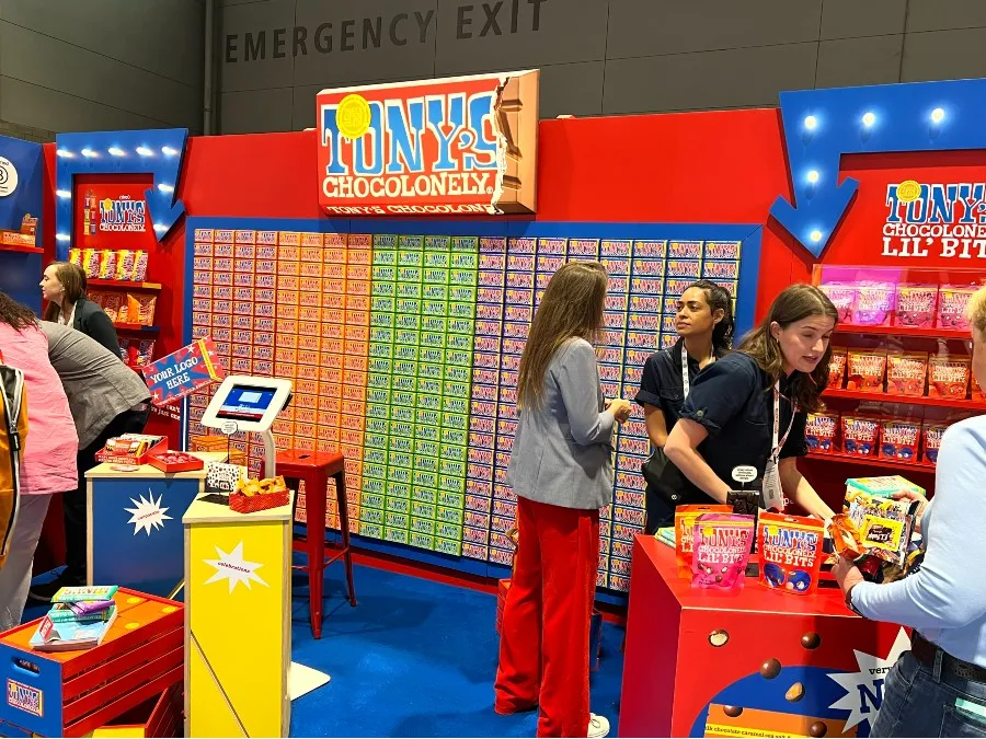Image shows Tony's Chocolonely booth at the Sweets & Snacks Expo.