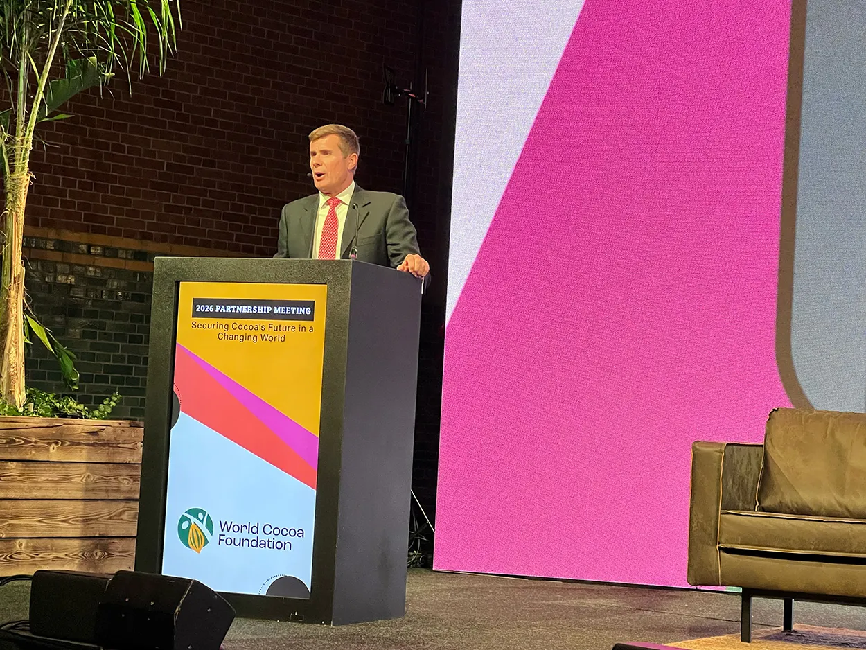 Image shows Chris Vincent, President of the World Cocoa Foundation, opening this year's Partnership Meeting. 