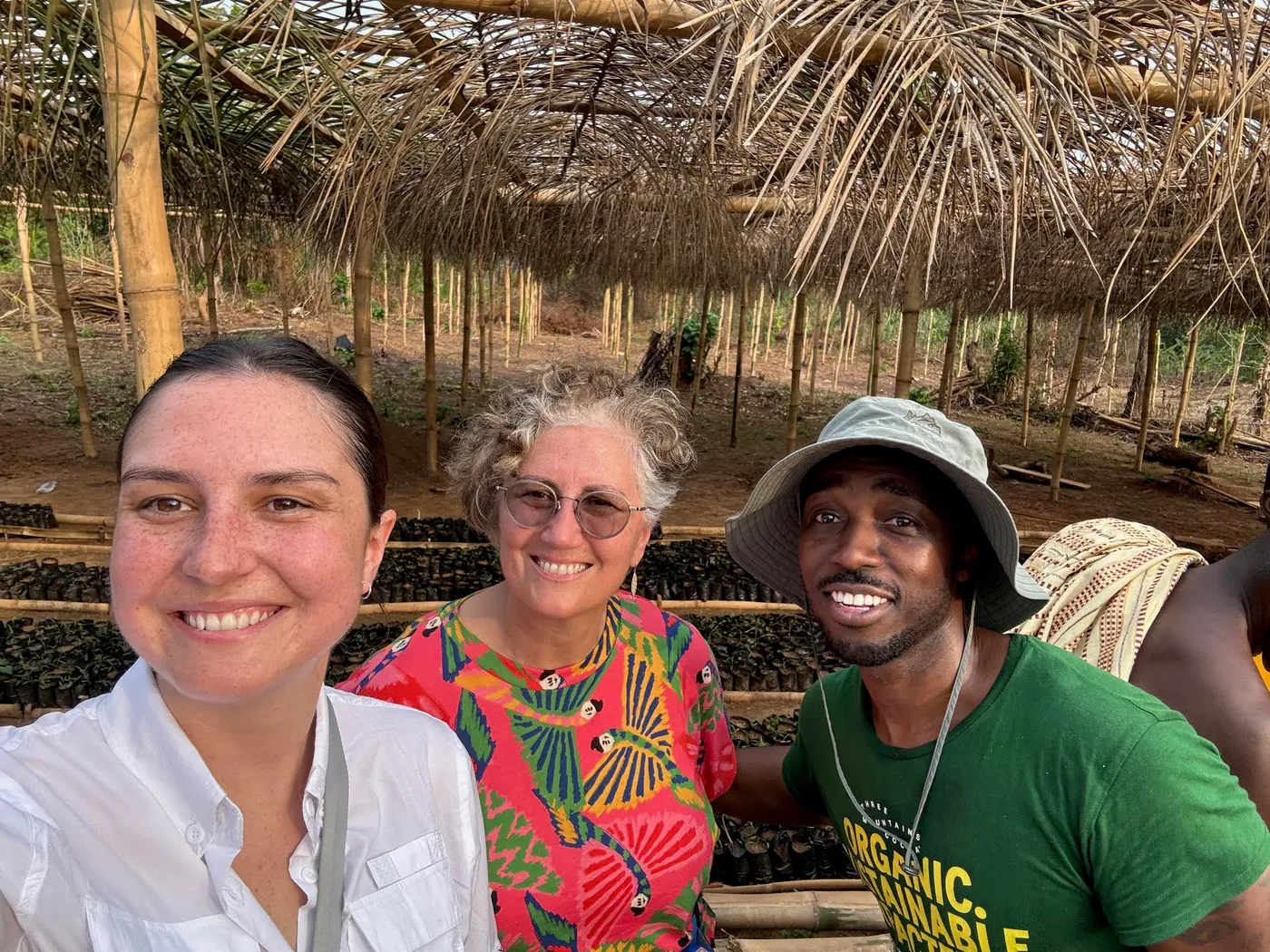 Image shows Ellie Thompson, Jean Thompson and Leslie Agyare at the SCCA"s project-supported seedling nursery