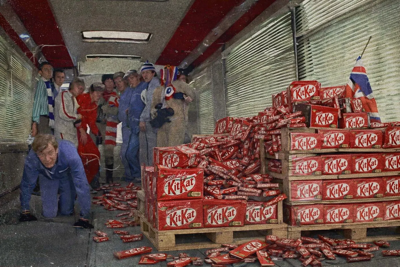 Image shows a still from The Italian Job film, with KitKats replacing Gold 