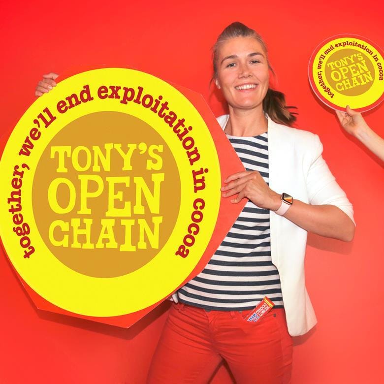 Image shows Joke Aerts Open Chain Lead at Tony’s Chocolonely with marketing material.